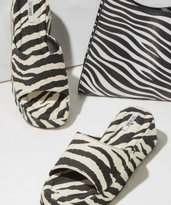 Cult Avenue - Darby Mule - Beige Zebra -Outerwear Shop cfab808f8f334ddb9c8cf4fa74084008 1024x1024